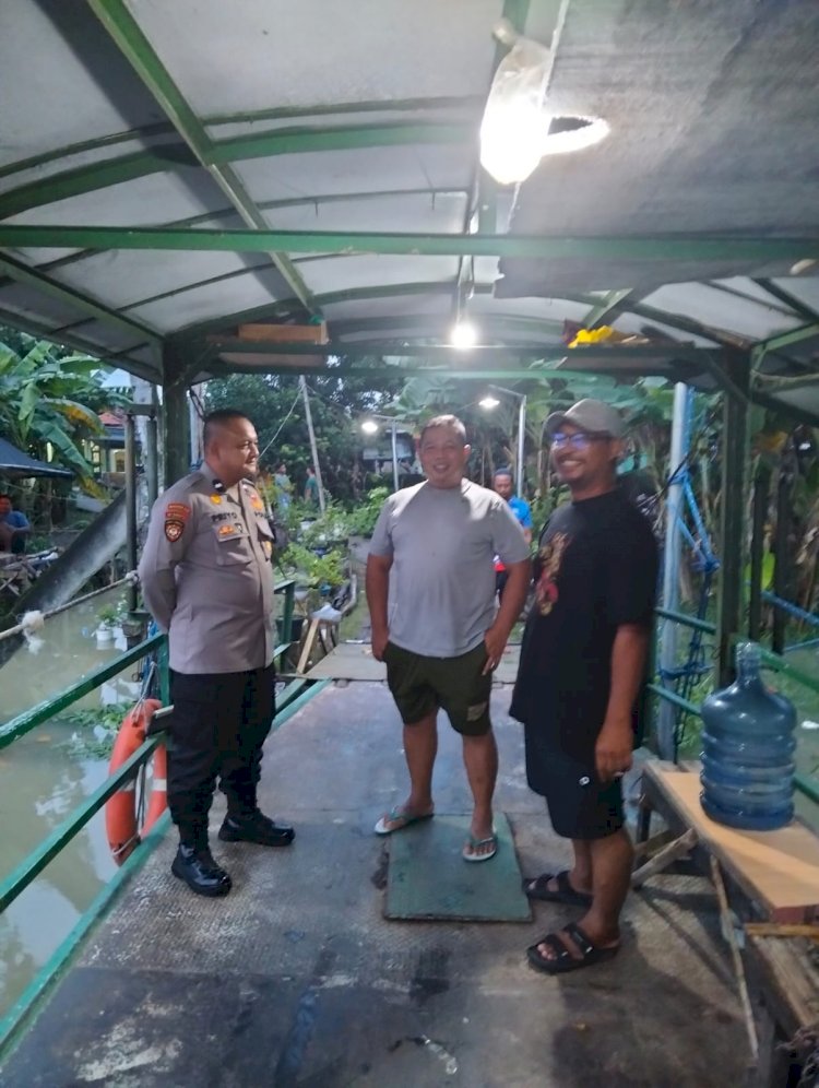 Curah Hujan Tinggi, Polisi Bersama Perangkat Desa Cek Debit Air Sungai dan Aktivitas Transportasi Tambang